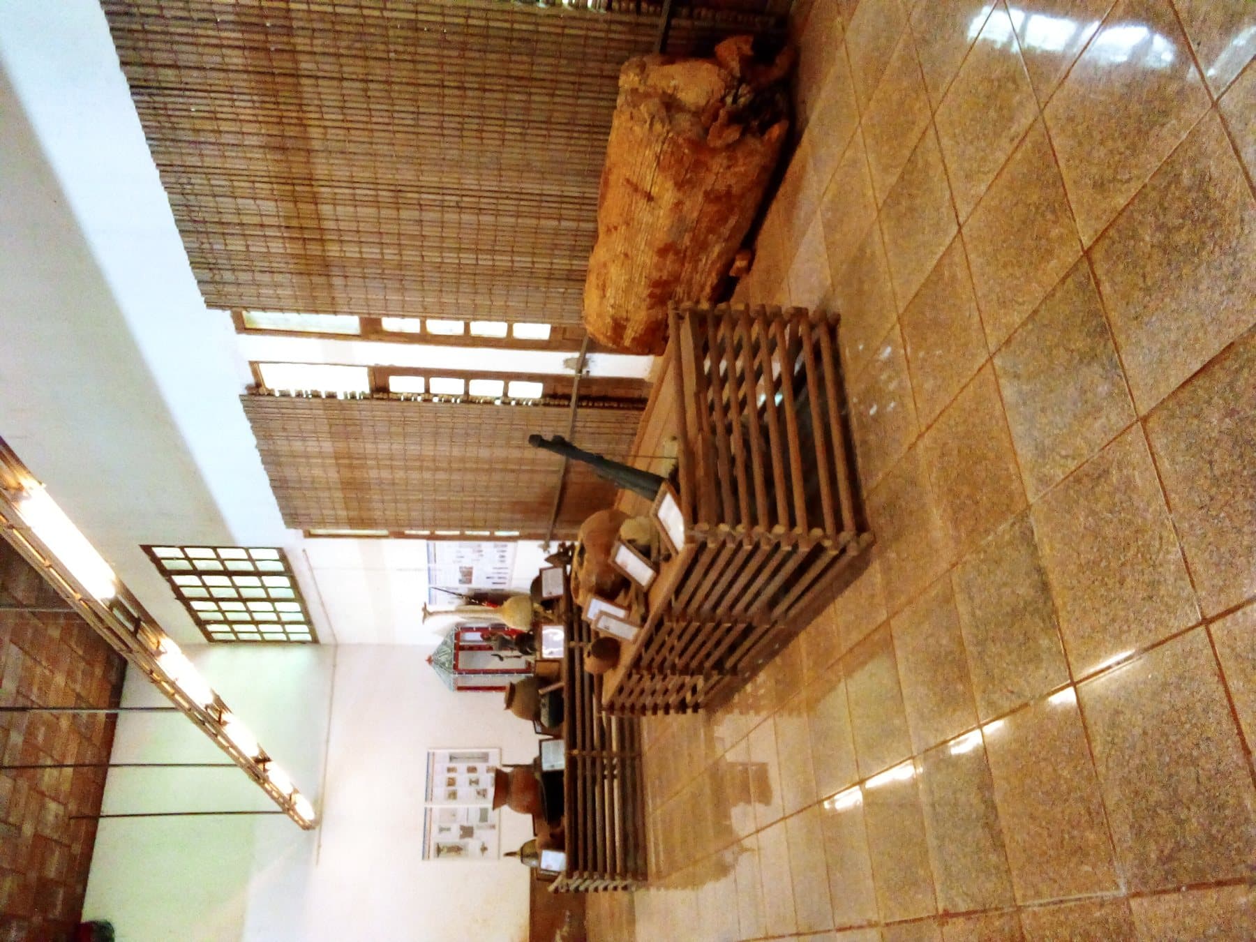 Interior of the Royal Museum displaying ancestral sculptures